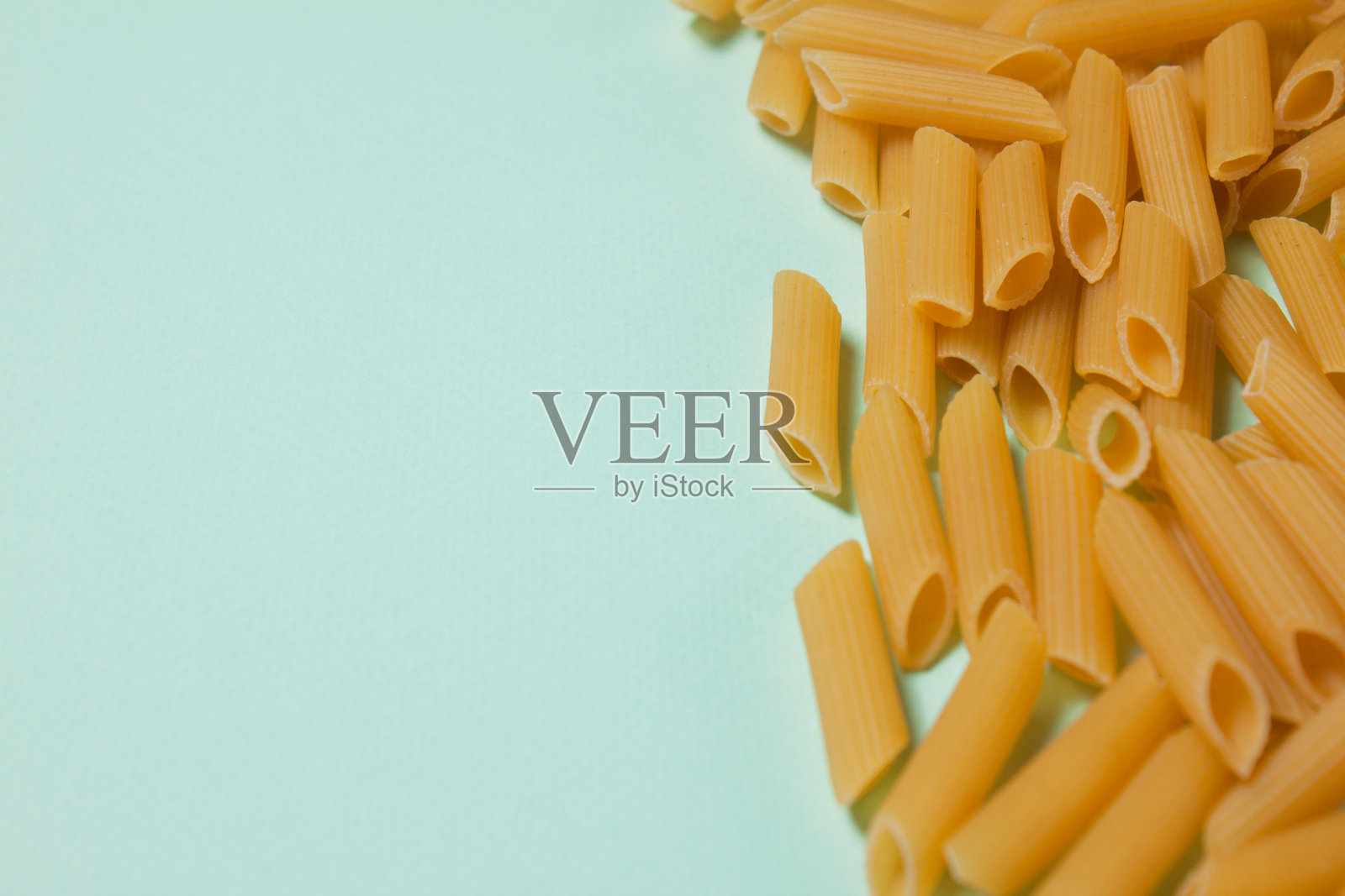 通心粉面食背景。意大利通心粉质地背景。照片摄影图片