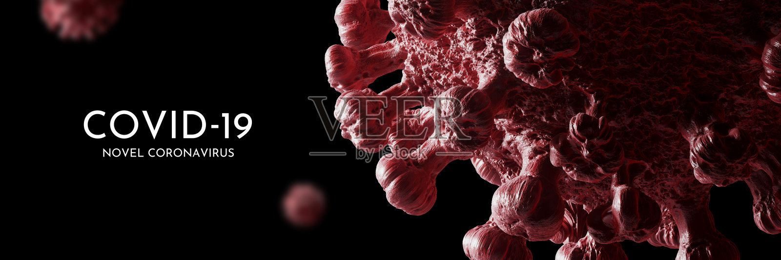 黑色背景上的白色“COVID-19 - Novel coronavirus”字母和COVID-19病毒照片摄影图片