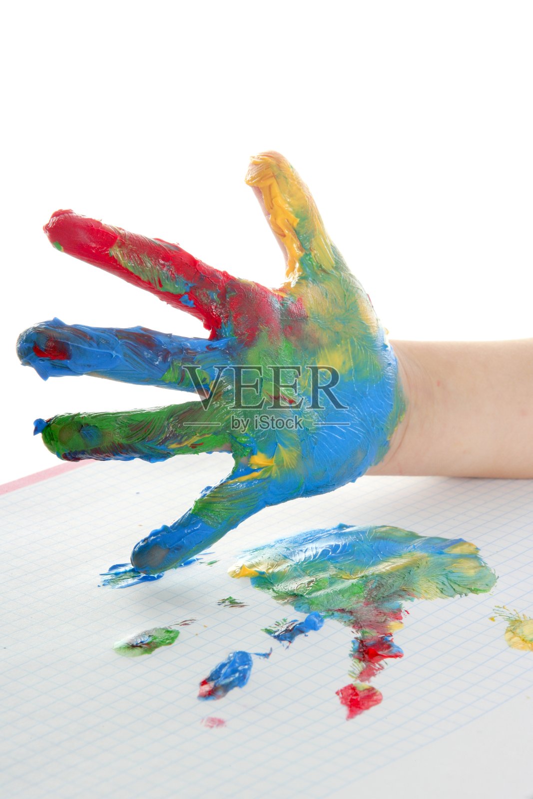 五颜六色的颜料,孩子们亲手涂成白色照片摄影图片