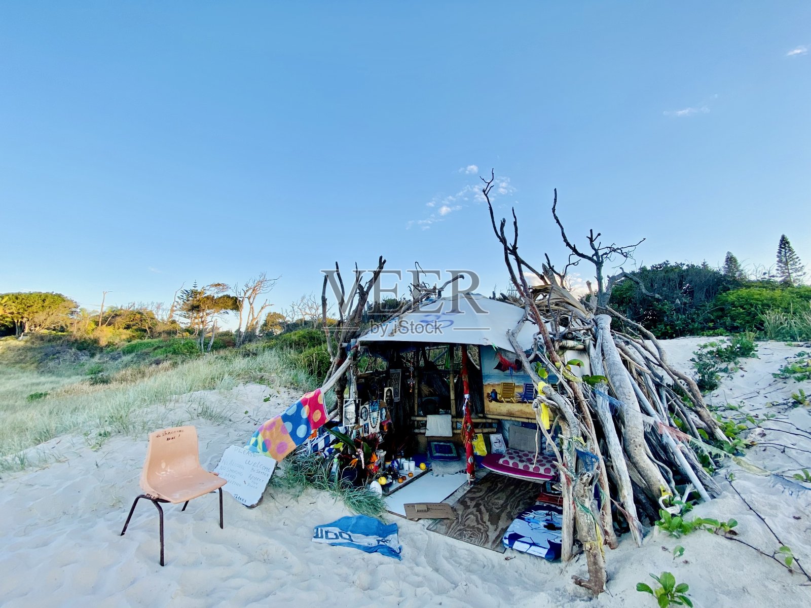 日落的拜伦湾海滩小屋照片摄影图片