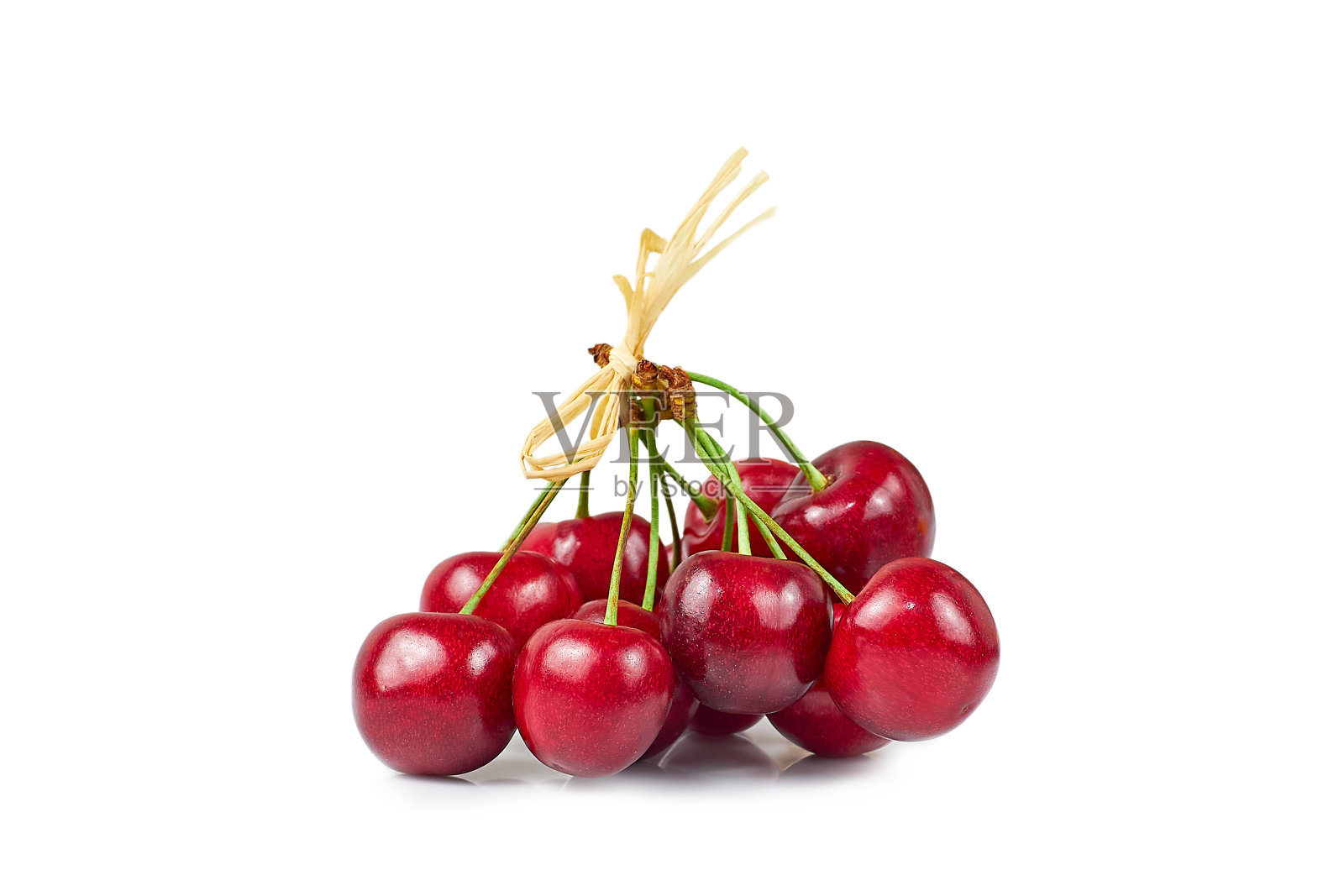 一把白色背景上的甜樱桃照片摄影图片
