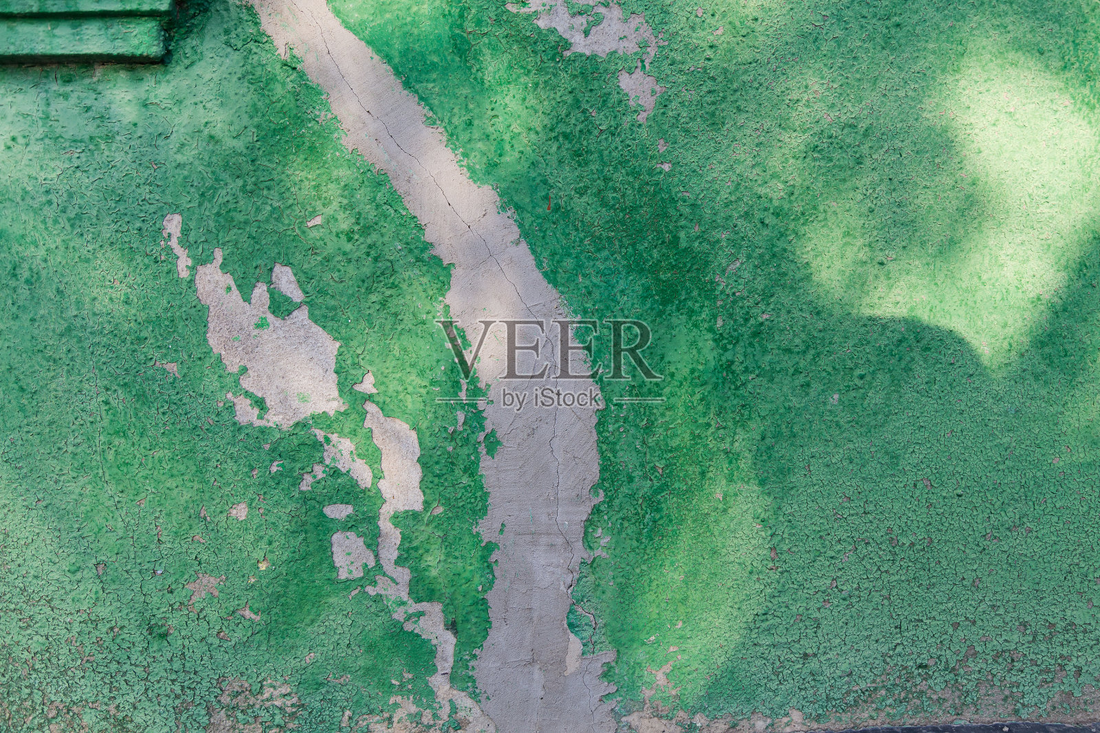 带有裂缝的粗糙粗糙的旧墙。背景设计照片摄影图片