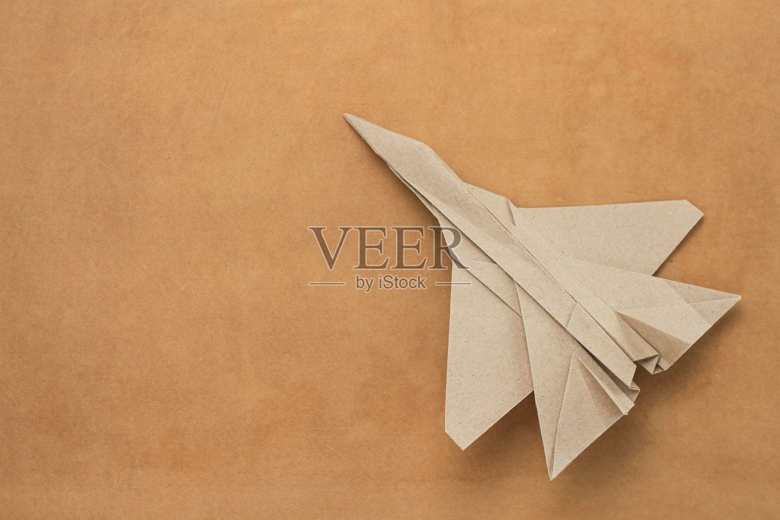 折纸飞机模型。有选择性的重点。老旧工艺照片摄影图片