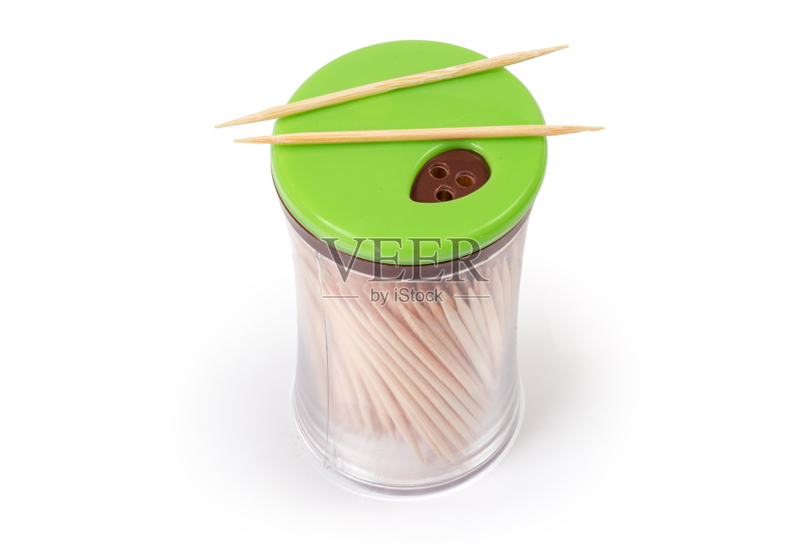 木制牙签在塑料容器与分配器在盖子照片摄影图片