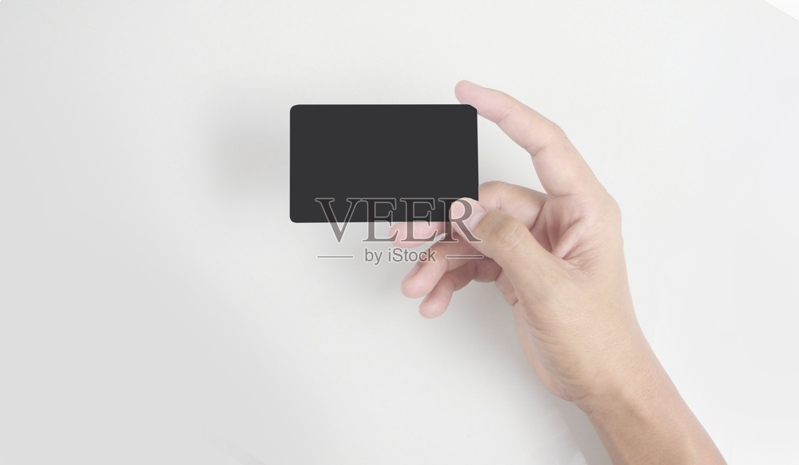 手握虚拟卡与您照片摄影图片