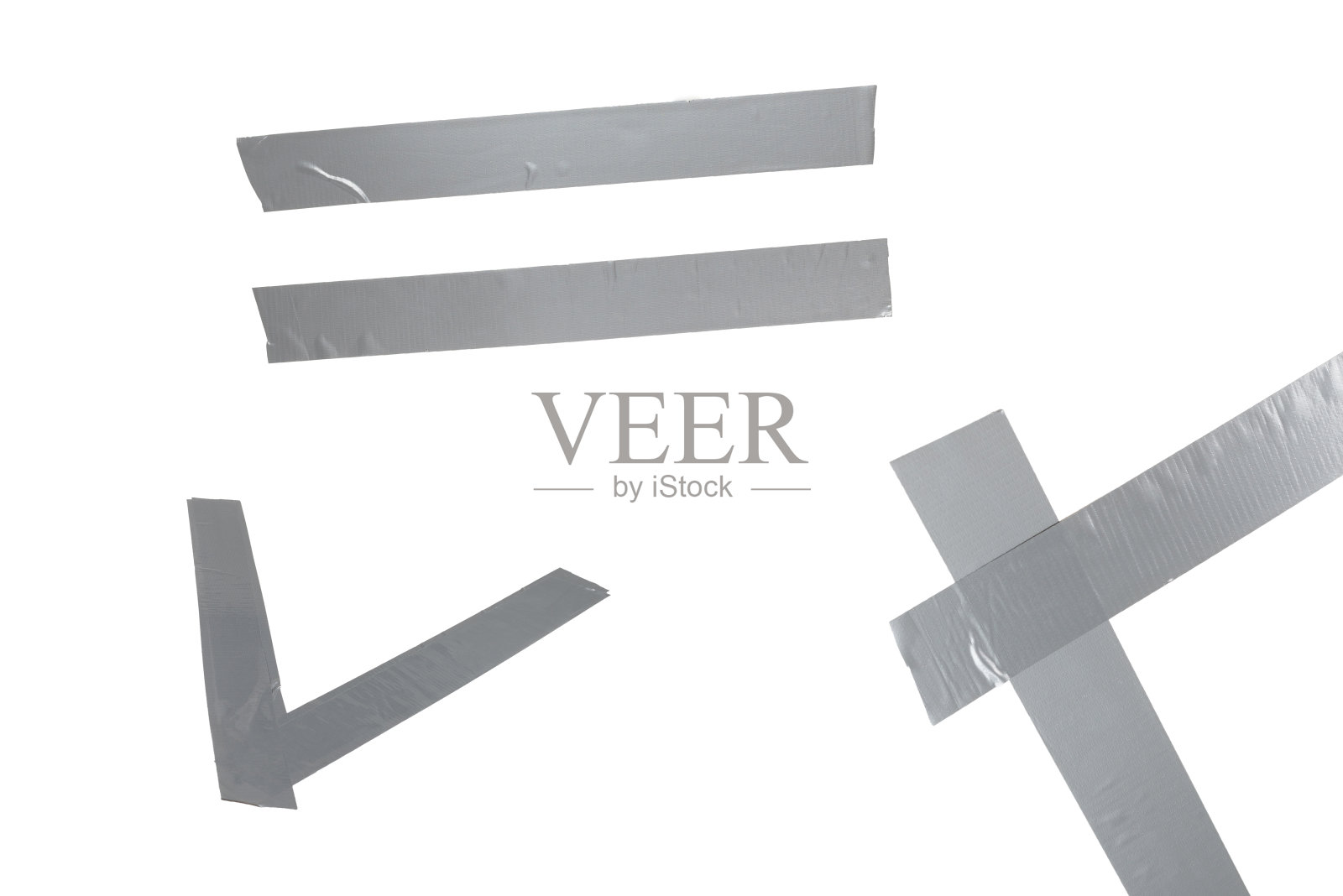 银色透明胶带片隔离在白色背景上。照片摄影图片