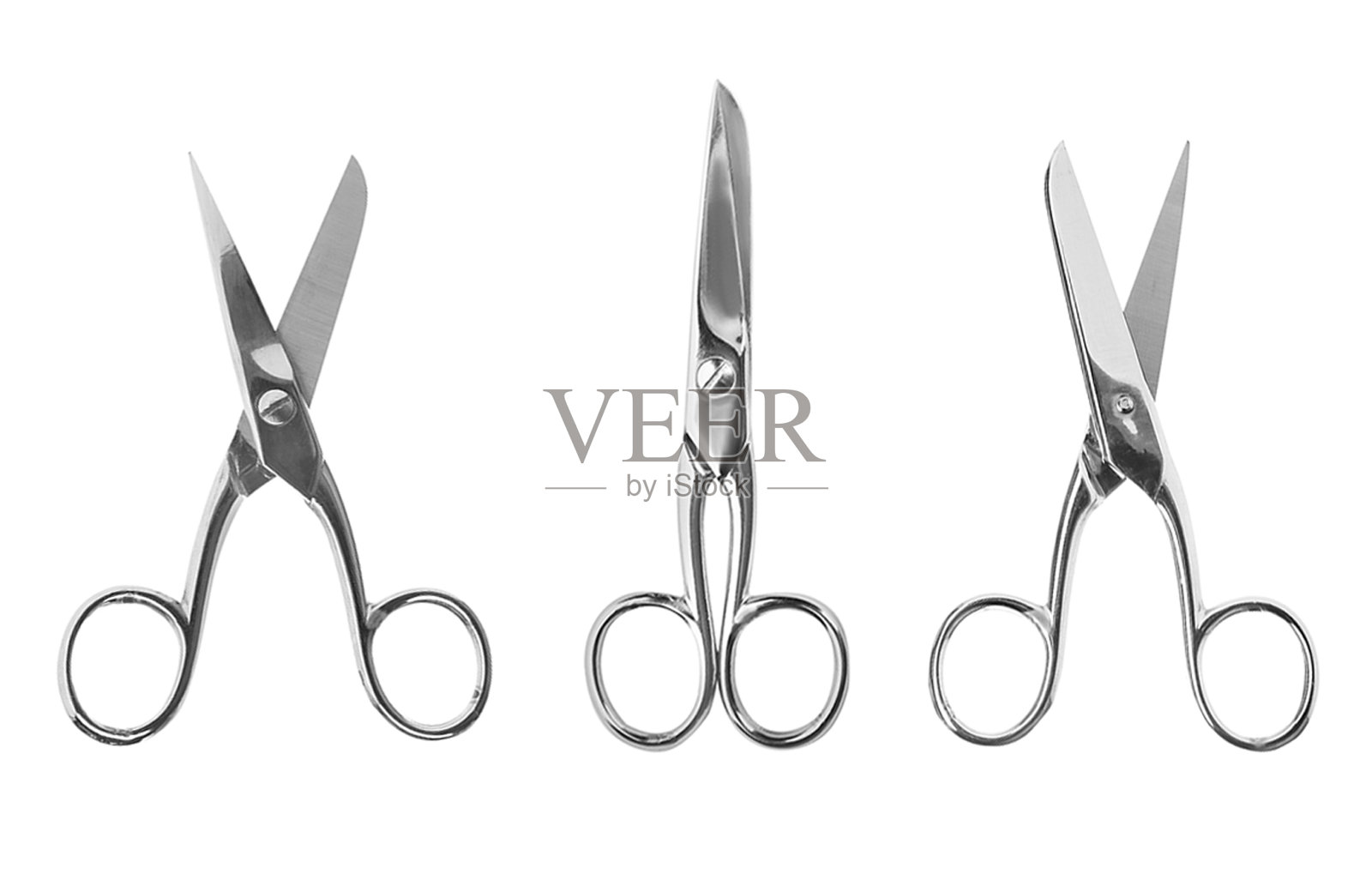 一套锋利的缝纫剪刀在白色背景,俯视图照片摄影图片