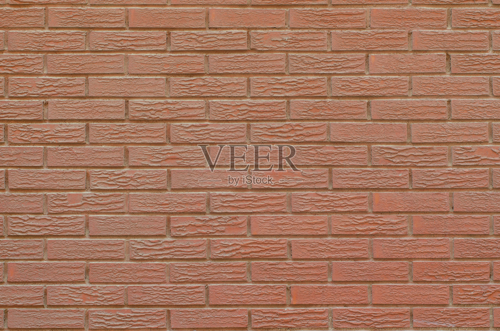 带有纹理的橙色肮脏砖墙。复制空间的经典砖墙。照片摄影图片