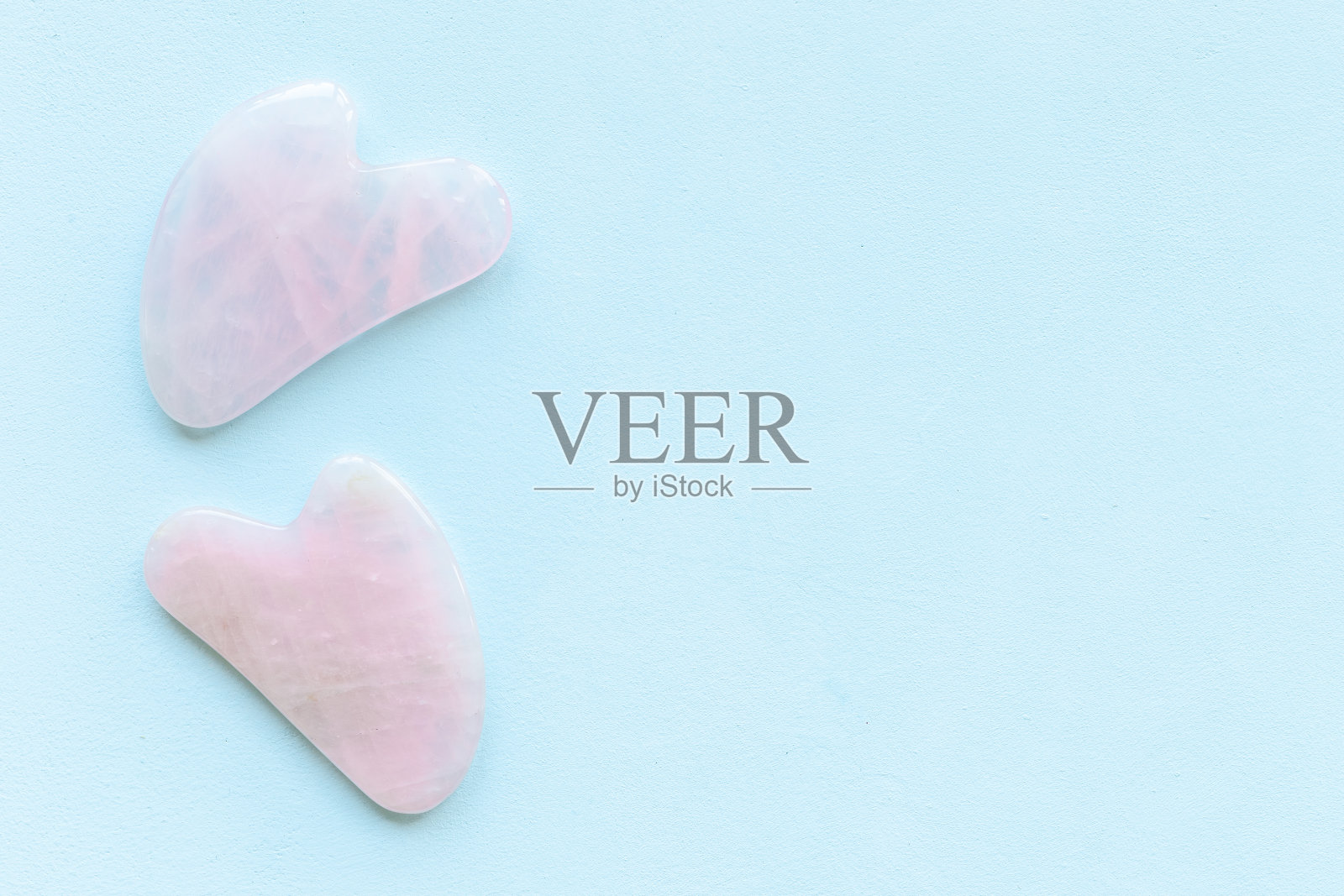 玫瑰瓜沙按摩石用于皮肤护理美容治疗照片摄影图片