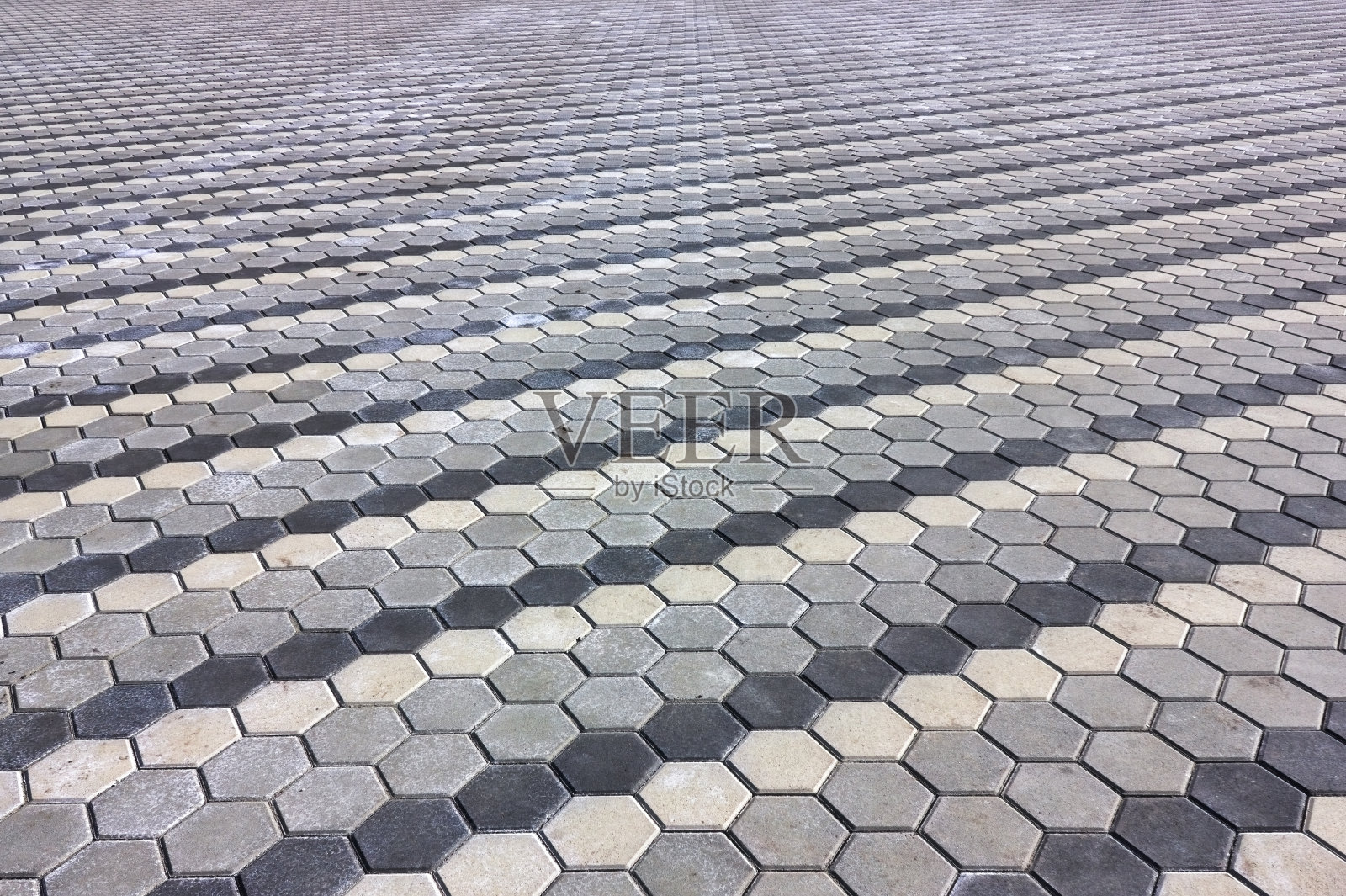 铺路板的纹理特写。混凝土路面板。漂亮的图案,背景特写。照片摄影图片
