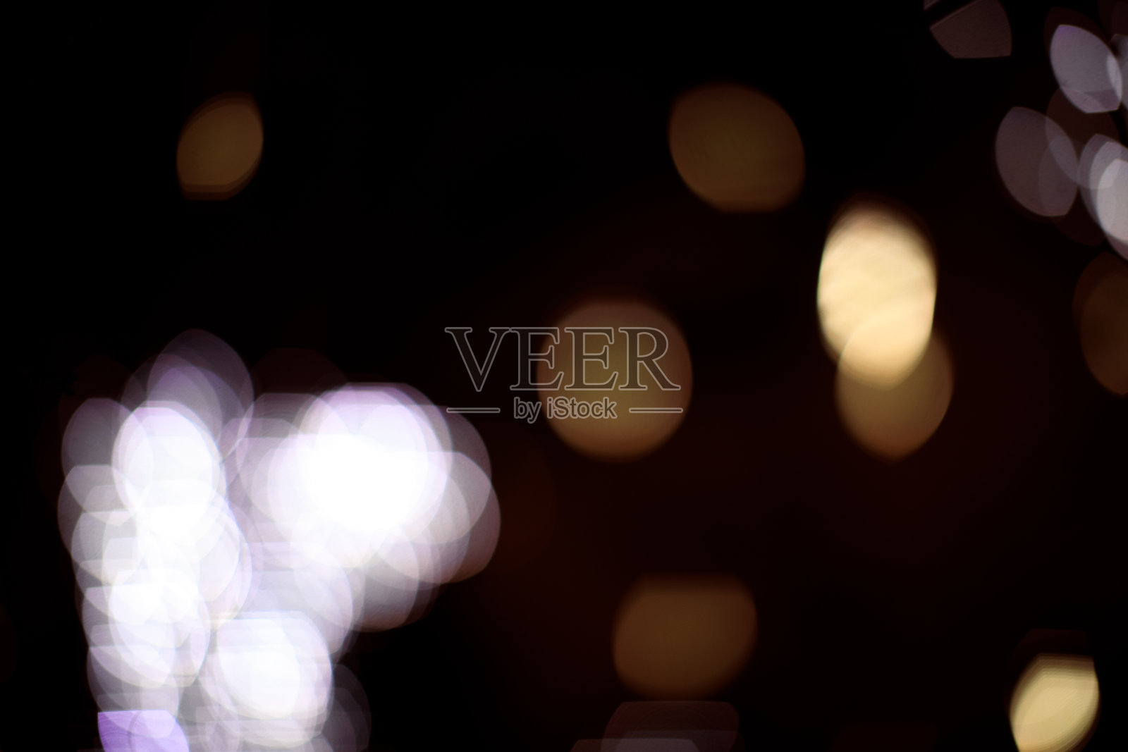 在黑色背景上的光散景照片摄影图片