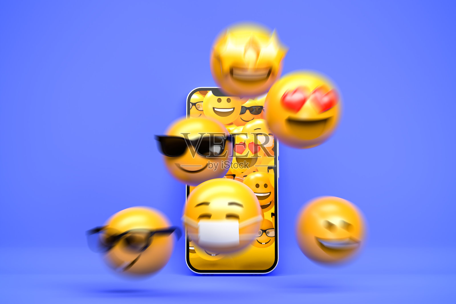 社交媒体概念:从手机中逃离的3d表情符号。动态模糊。照片摄影图片