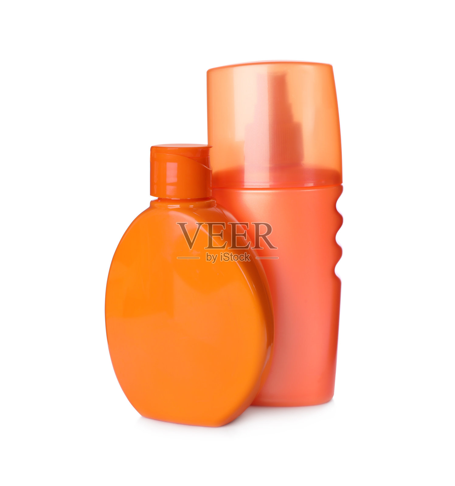 装有防晒产品的瓶子被隔离在白色上照片摄影图片