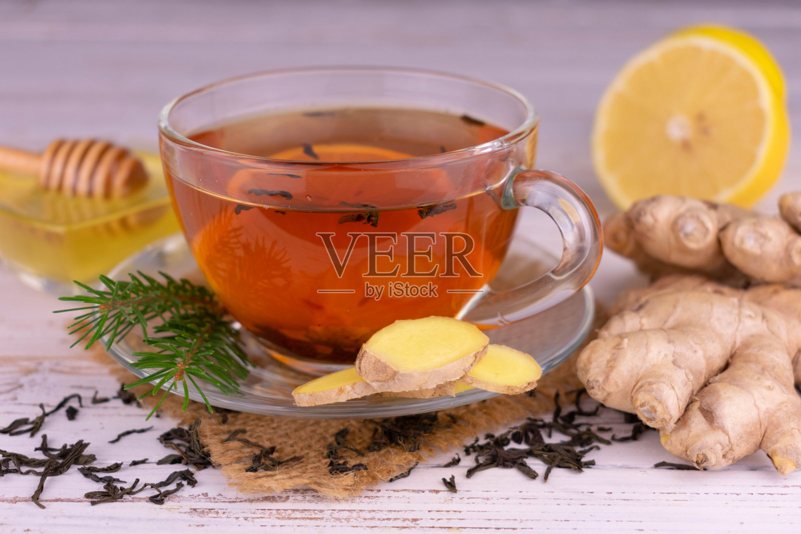 茶加蜂蜜,柠檬和姜。特写镜头。照片摄影图片