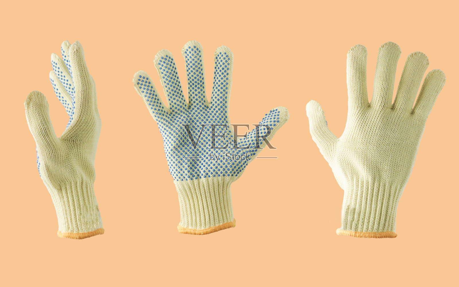 白、黄防滑针织手套照片摄影图片