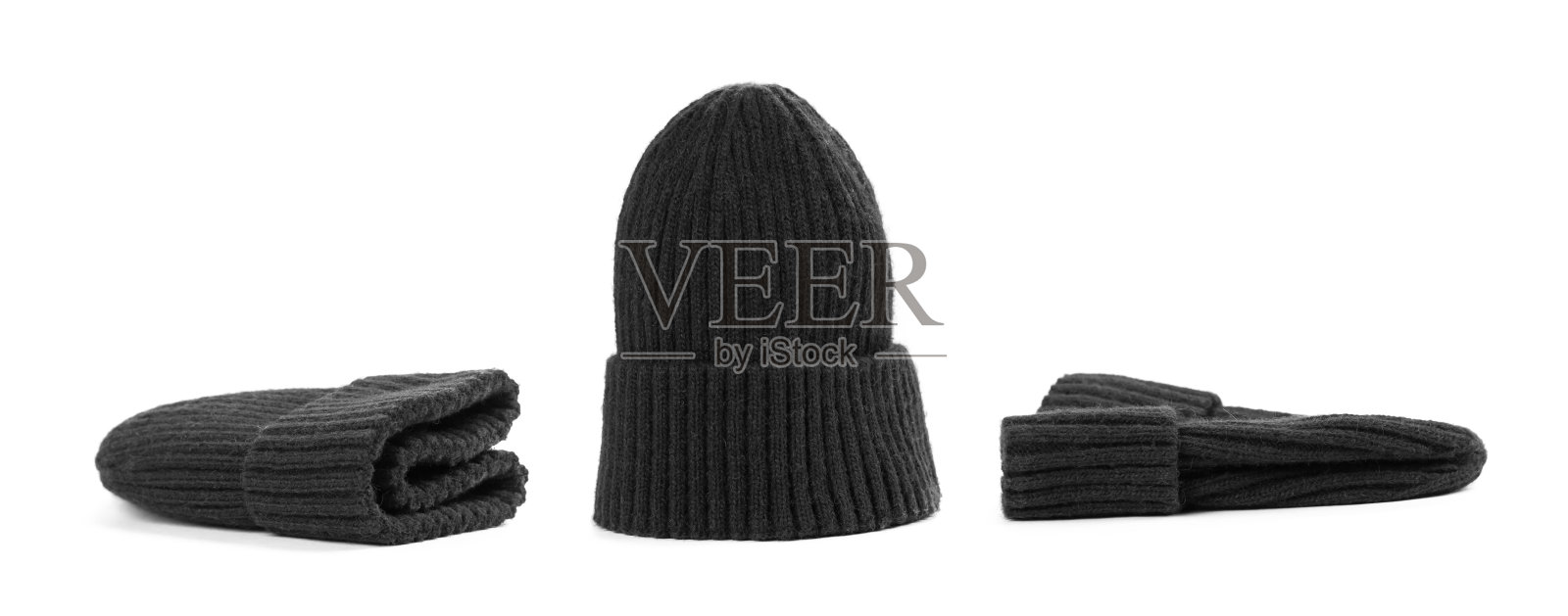 一套黑色的帽子在白色的背景照片摄影图片