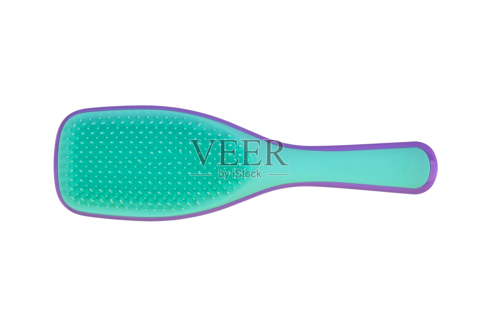 绿色和紫色的塑料梳子,按摩刷,孤立在白色背景上照片摄影图片