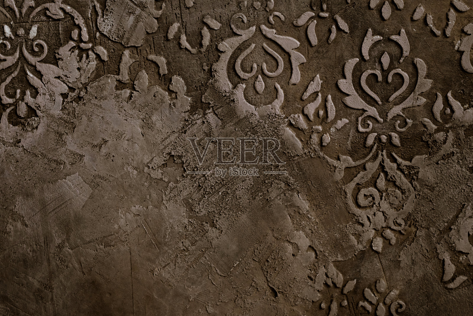 旧抹灰水泥墙纹理背景上的荒废图案照片摄影图片