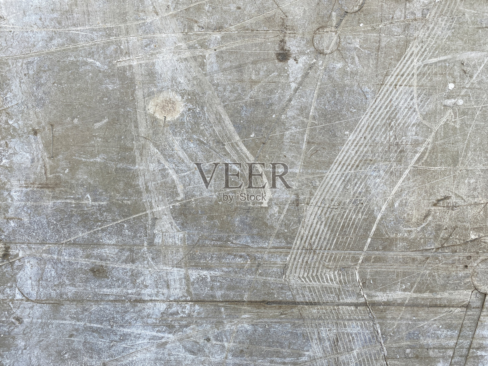 顶视图灰色垃圾纹理粗糙的石头背景与裂缝,划痕和污渍。照片摄影图片