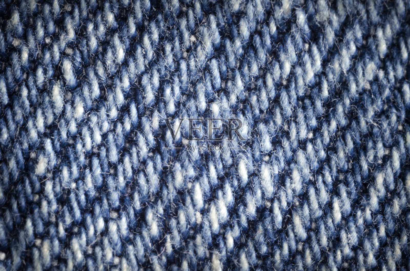 蓝色的纺织品。粗糙的背景照片摄影图片