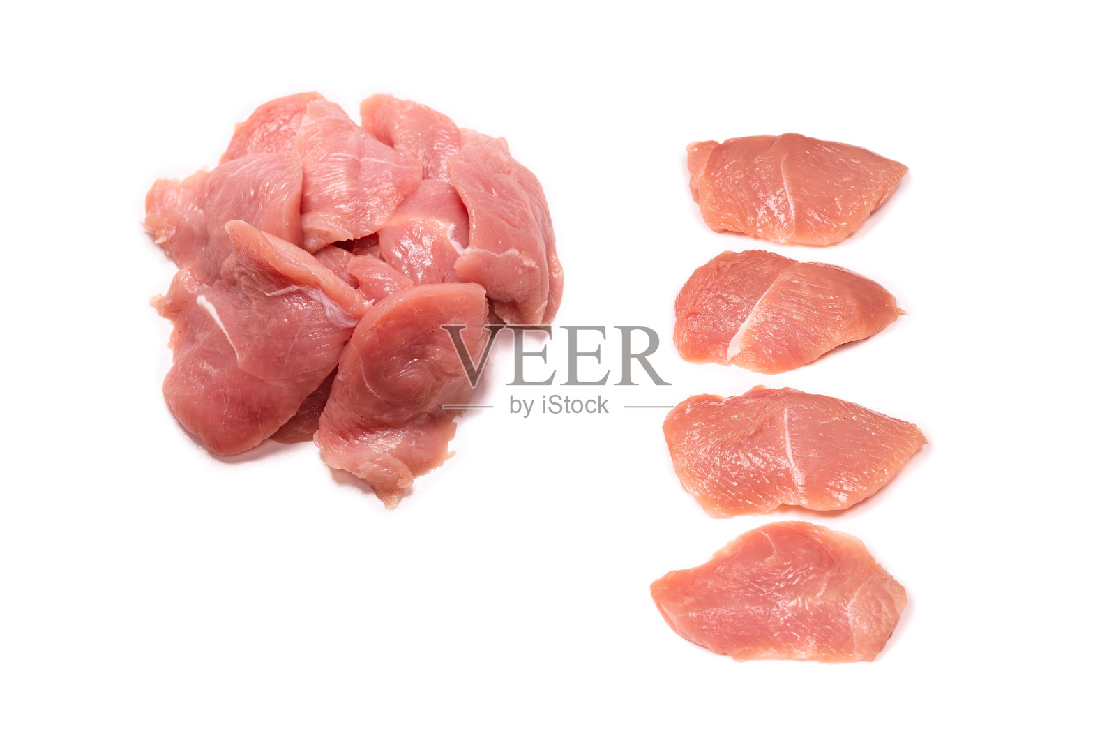 火鸡鱼片放在白色的背景上。照片摄影图片