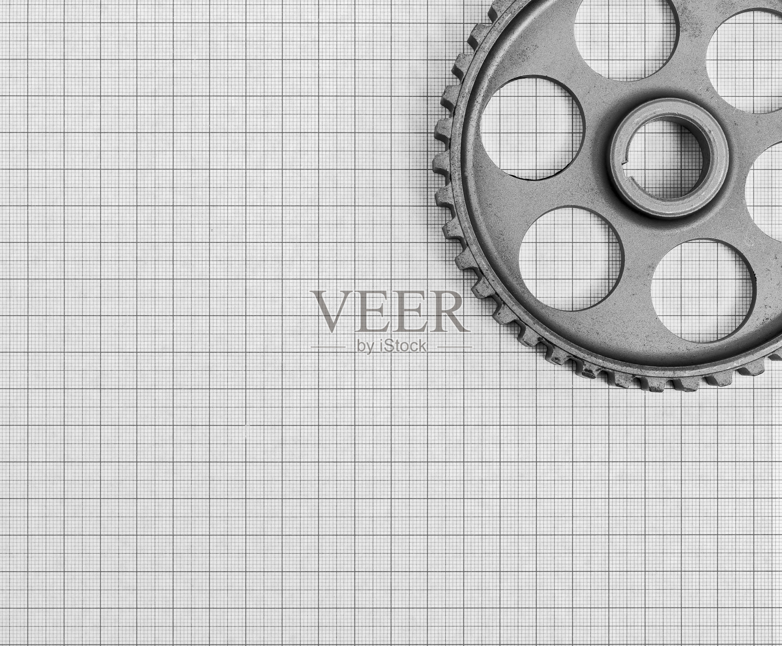 技术主题是在毫米纸的背景上照片摄影图片