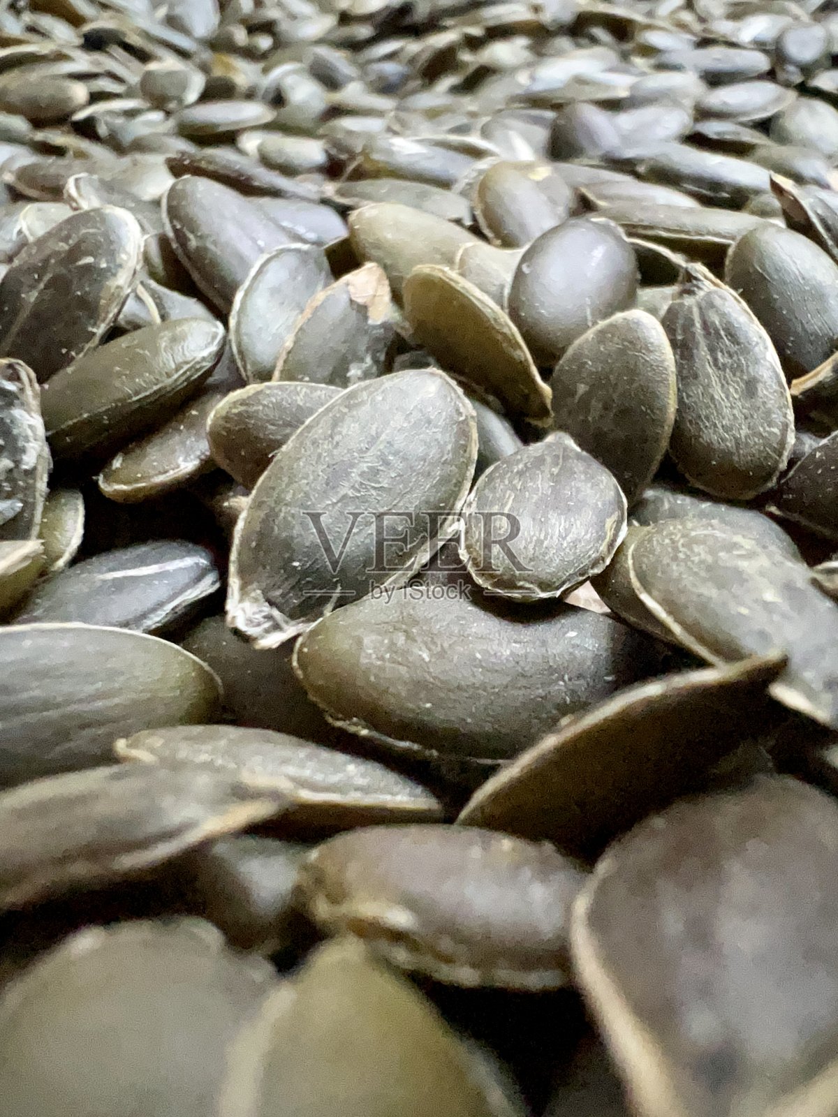 南瓜种子引人入胜照片摄影图片