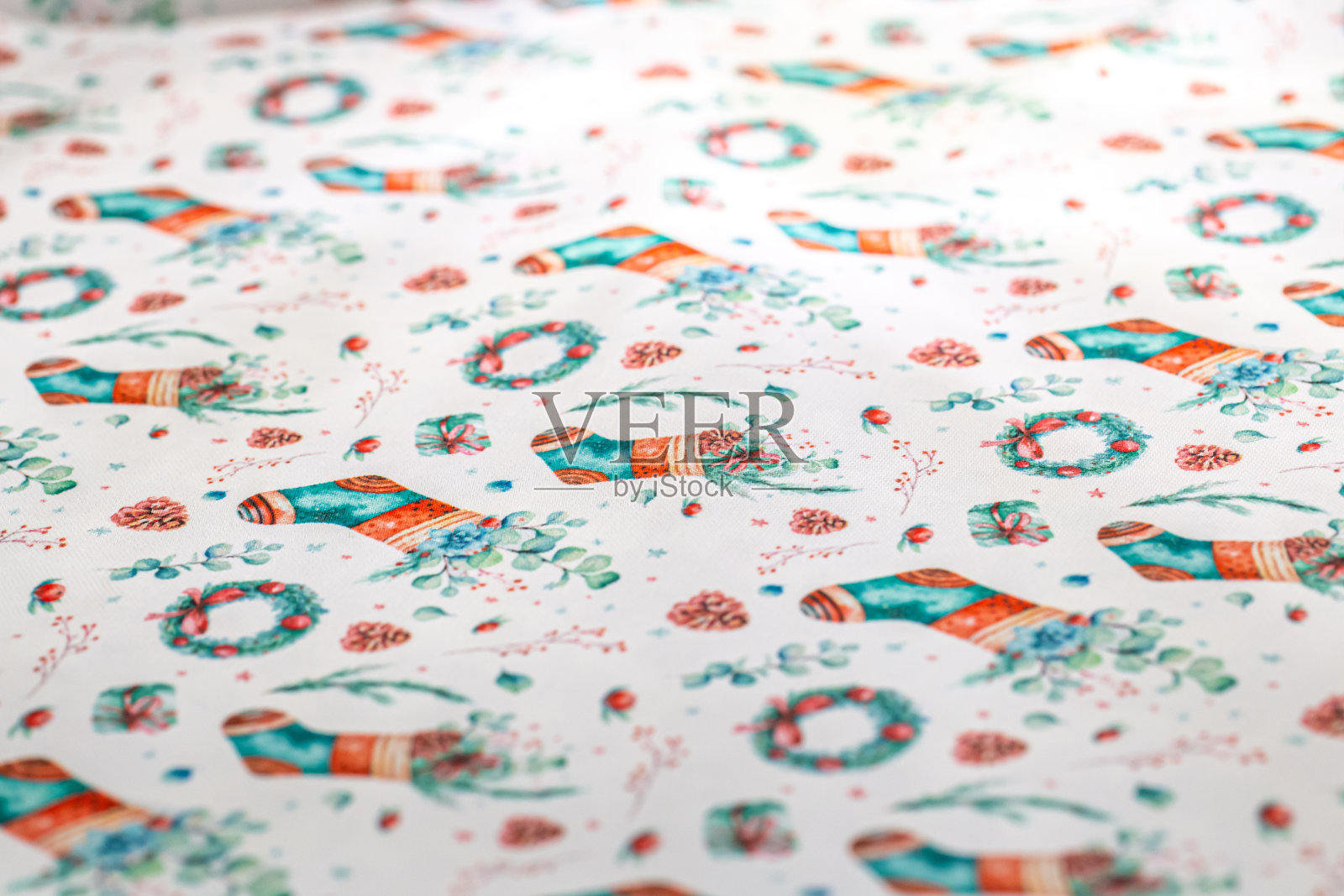 布与圣诞印花特写,节日桌布。照片摄影图片