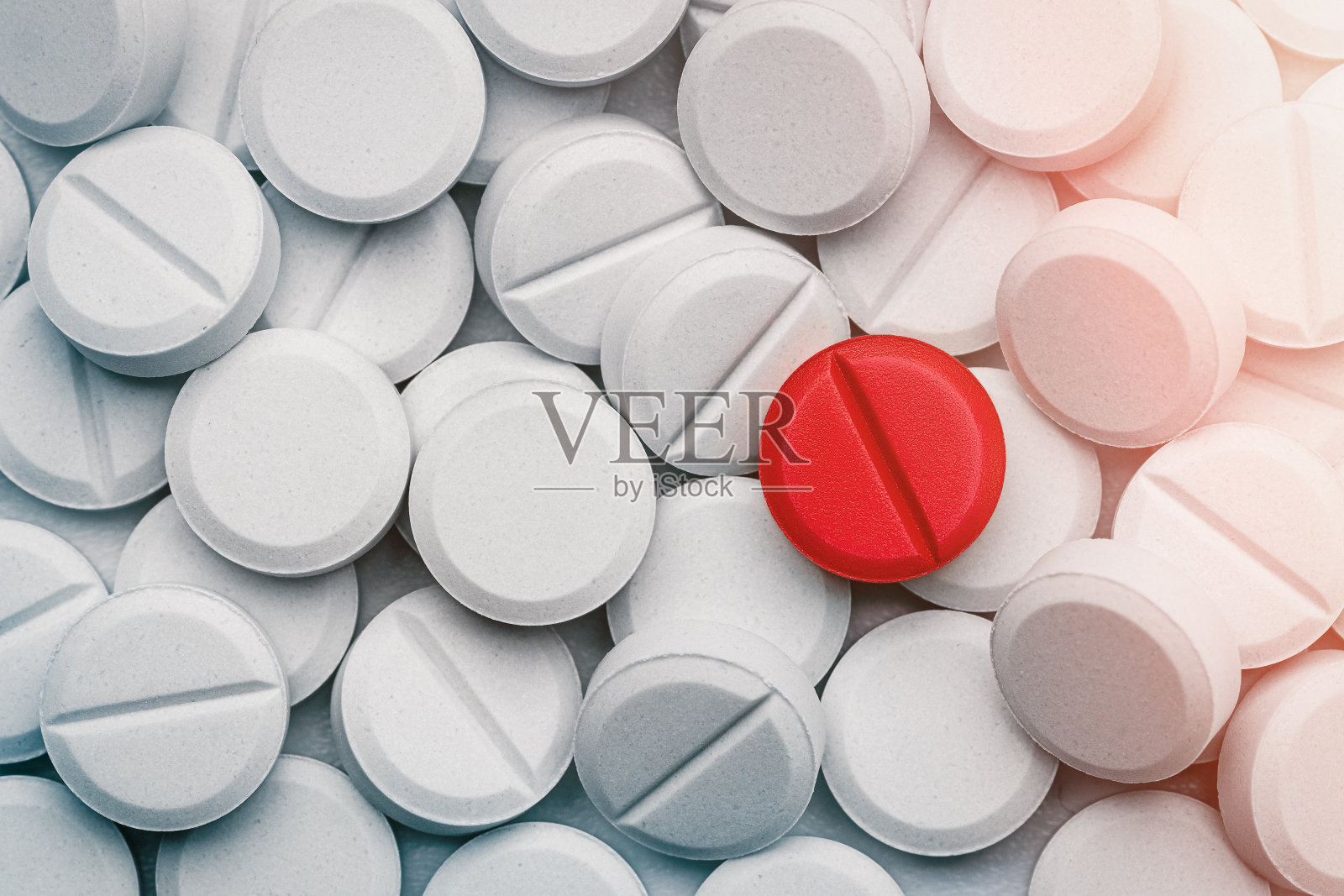 很多圆形的白色药丸。药店药物。背景、壁纸、纹理。照片摄影图片