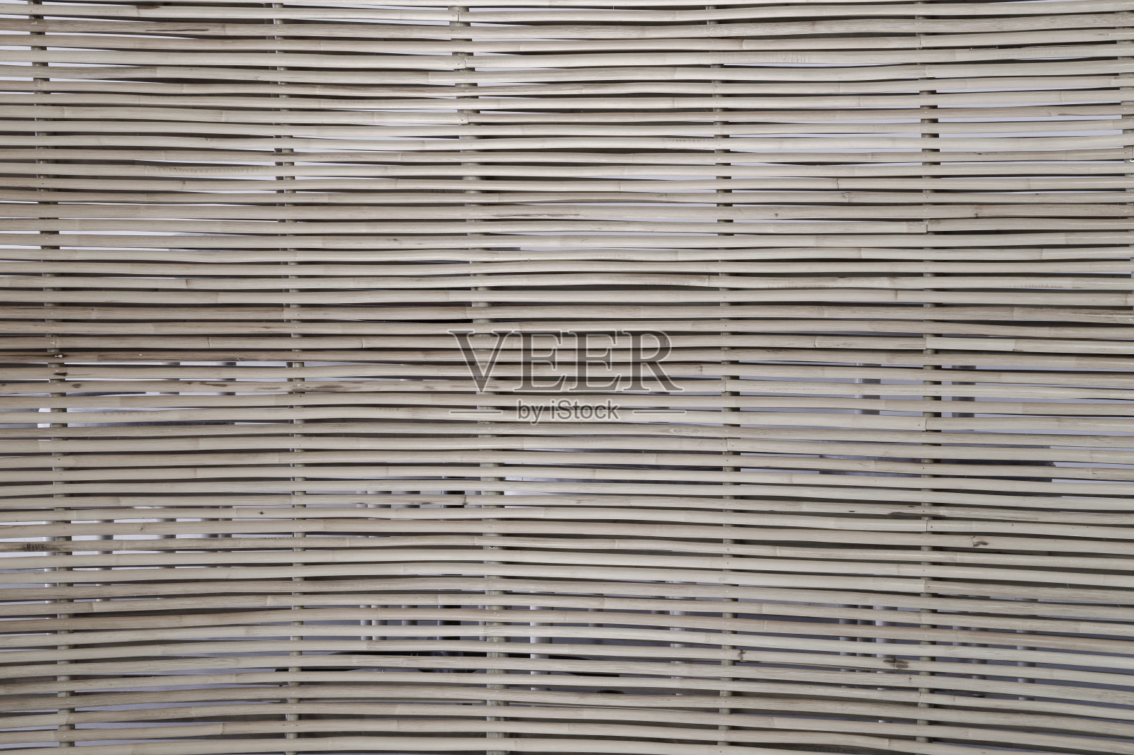 自然背景为棕色手工艺品编织纹理的藤面照片摄影图片