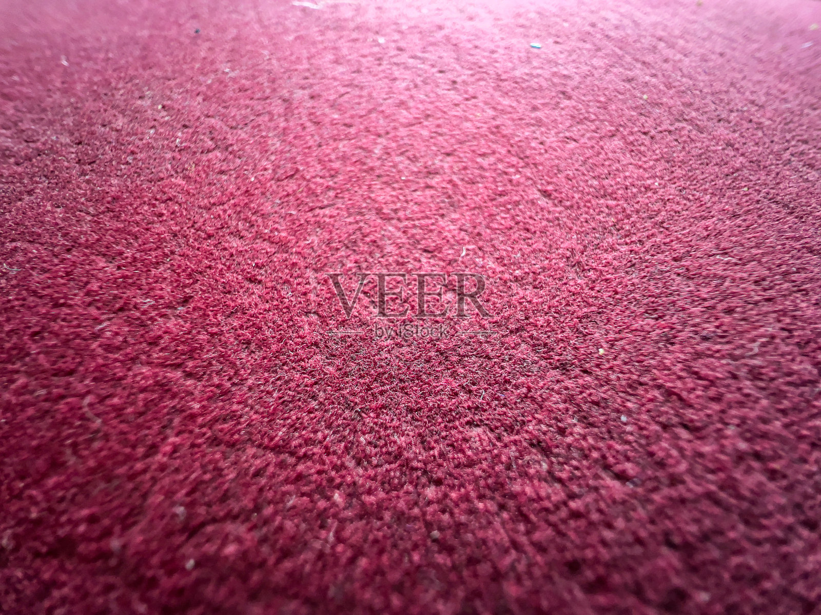 一种红粉色的织物,用作纹理或底色。照片摄影图片