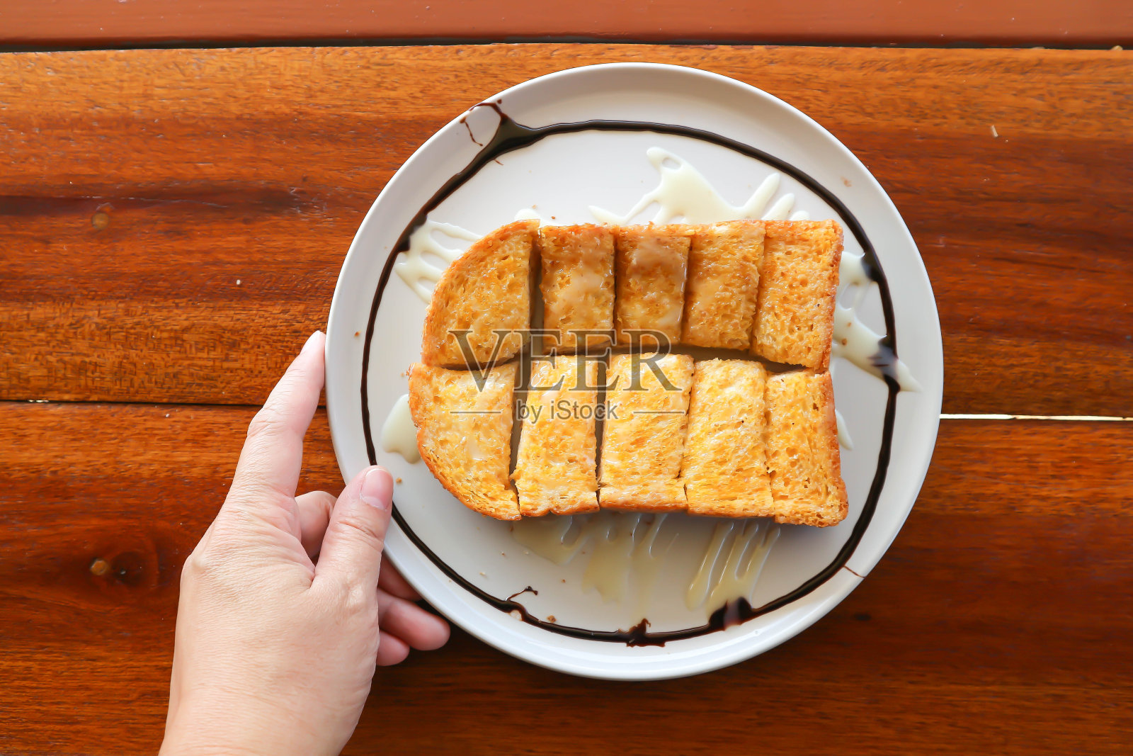 吐司或涂有黄油的面包,吐司面包照片摄影图片