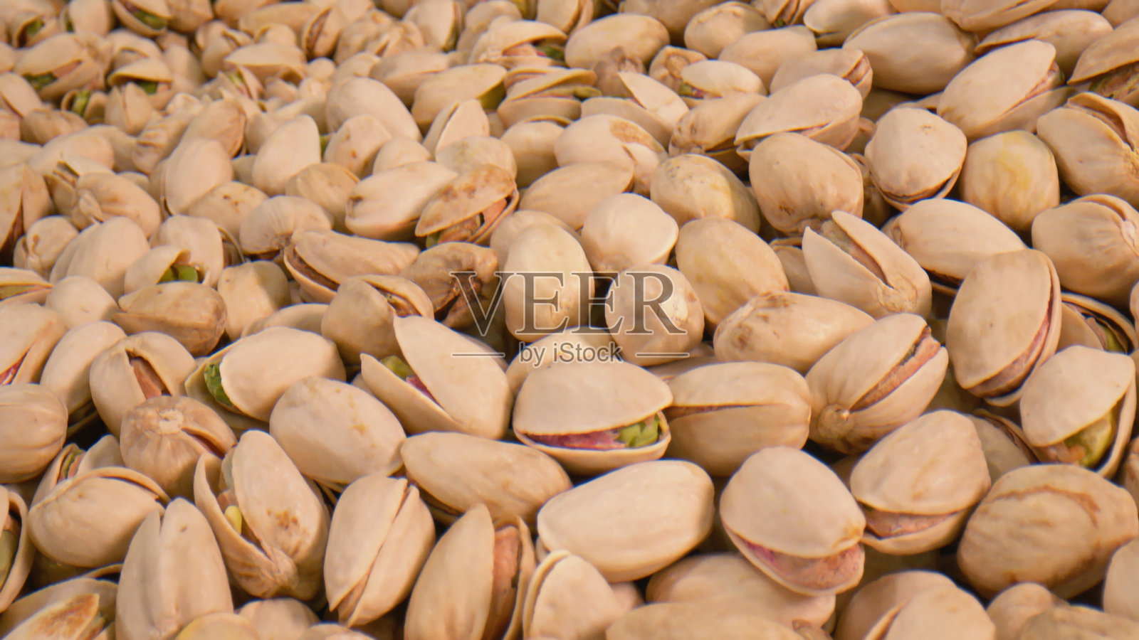 坚果堆的开心果照片摄影图片