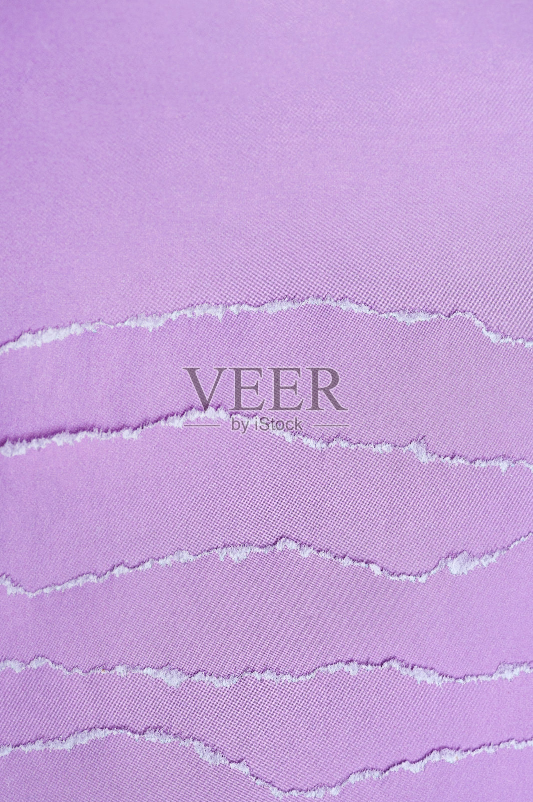 抽象的背景。一层层的彩纸。撕边。垂直图照片摄影图片