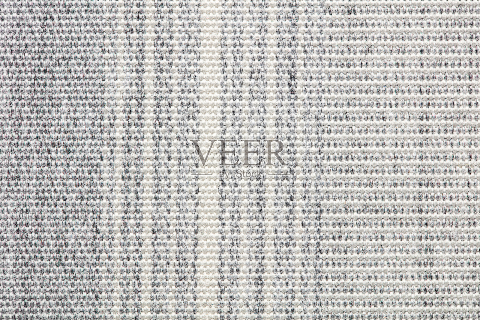 灰色织物纹理的背景。照片摄影图片