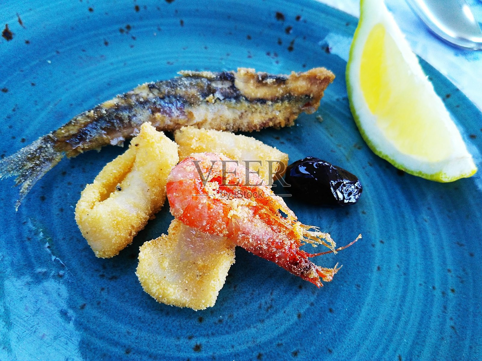 西班牙餐厅的海鲜开胃菜照片摄影图片