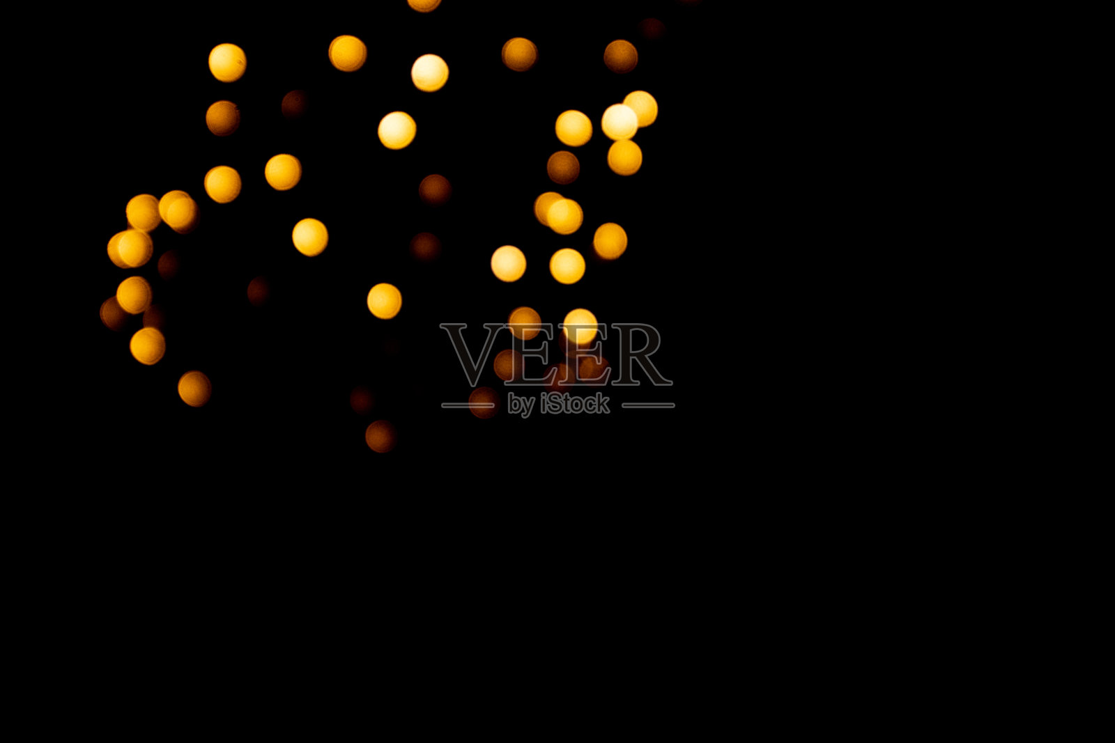 圣诞装饰,散景,金色和白色的灯,背景照明。照片摄影图片