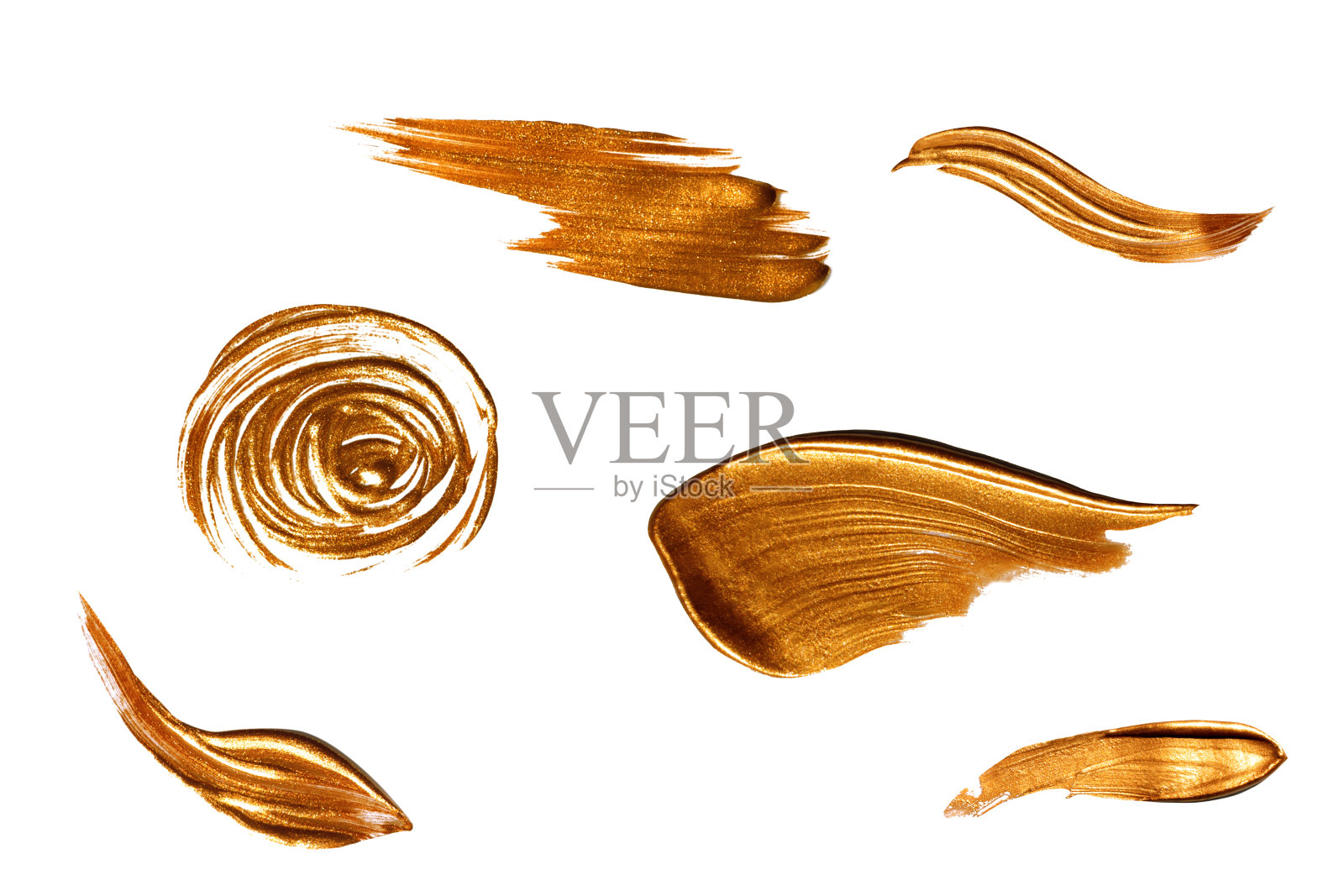 纹理的金色笔画孤立在白色背景上。照片摄影图片