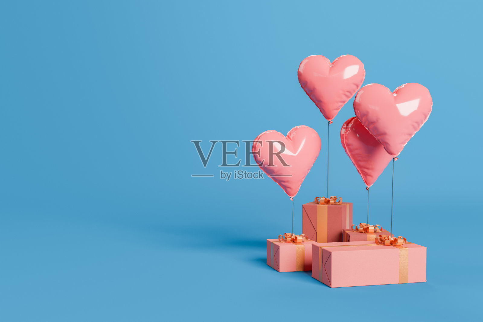 上面有心形气球的礼盒照片摄影图片