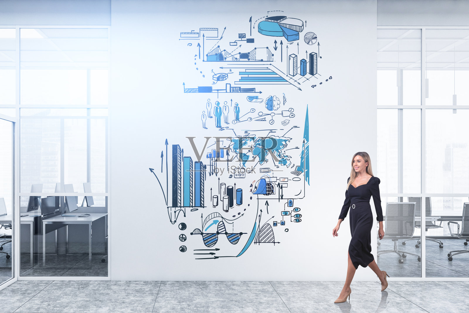 身着黑裙的女商人走进办公室,墙上画着素描照片摄影图片