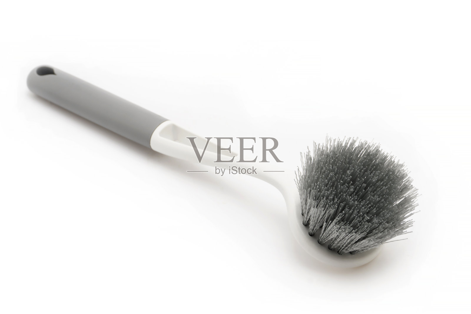 清洁工具在白色背景。照片摄影图片