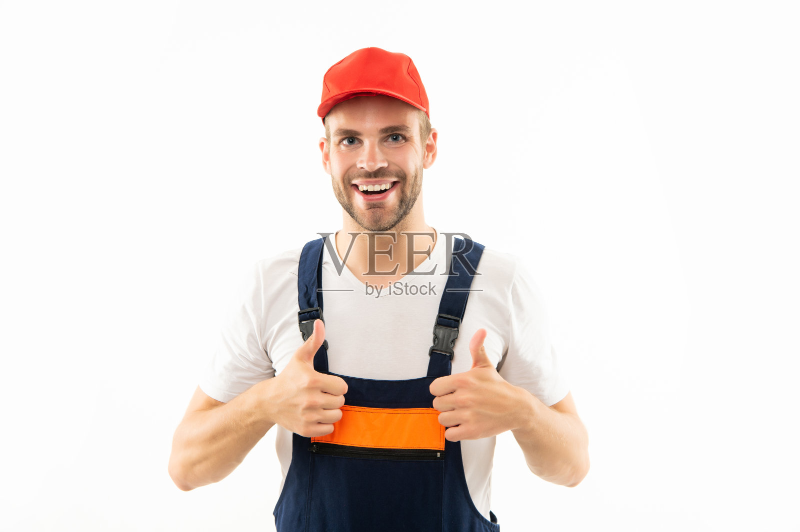 建筑工人被隔离在白色。戴着帽子和制服的建筑工。人工程师照片摄影图片