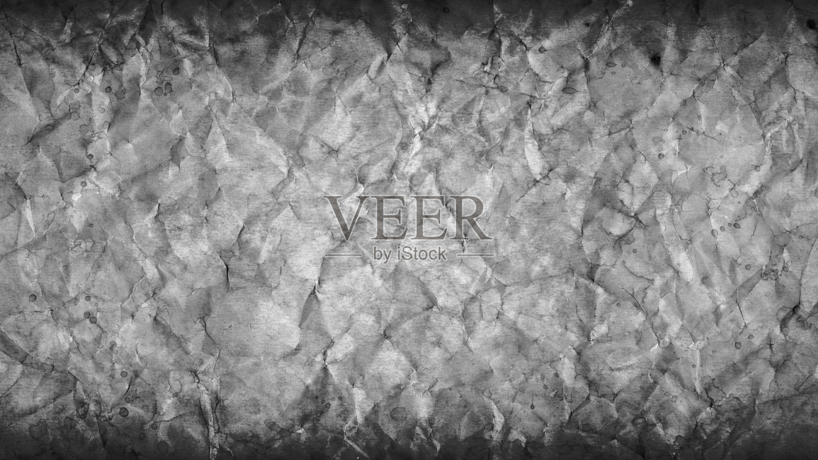 单调的纸张背景与皱纹。照片摄影图片