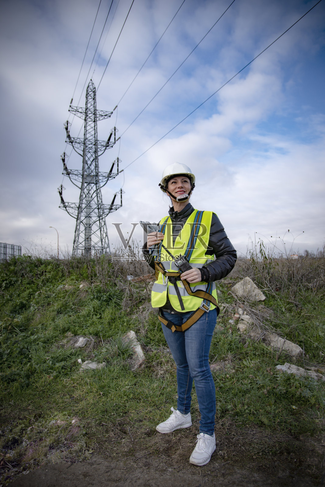 在工作中使用安全设备的女性照片摄影图片