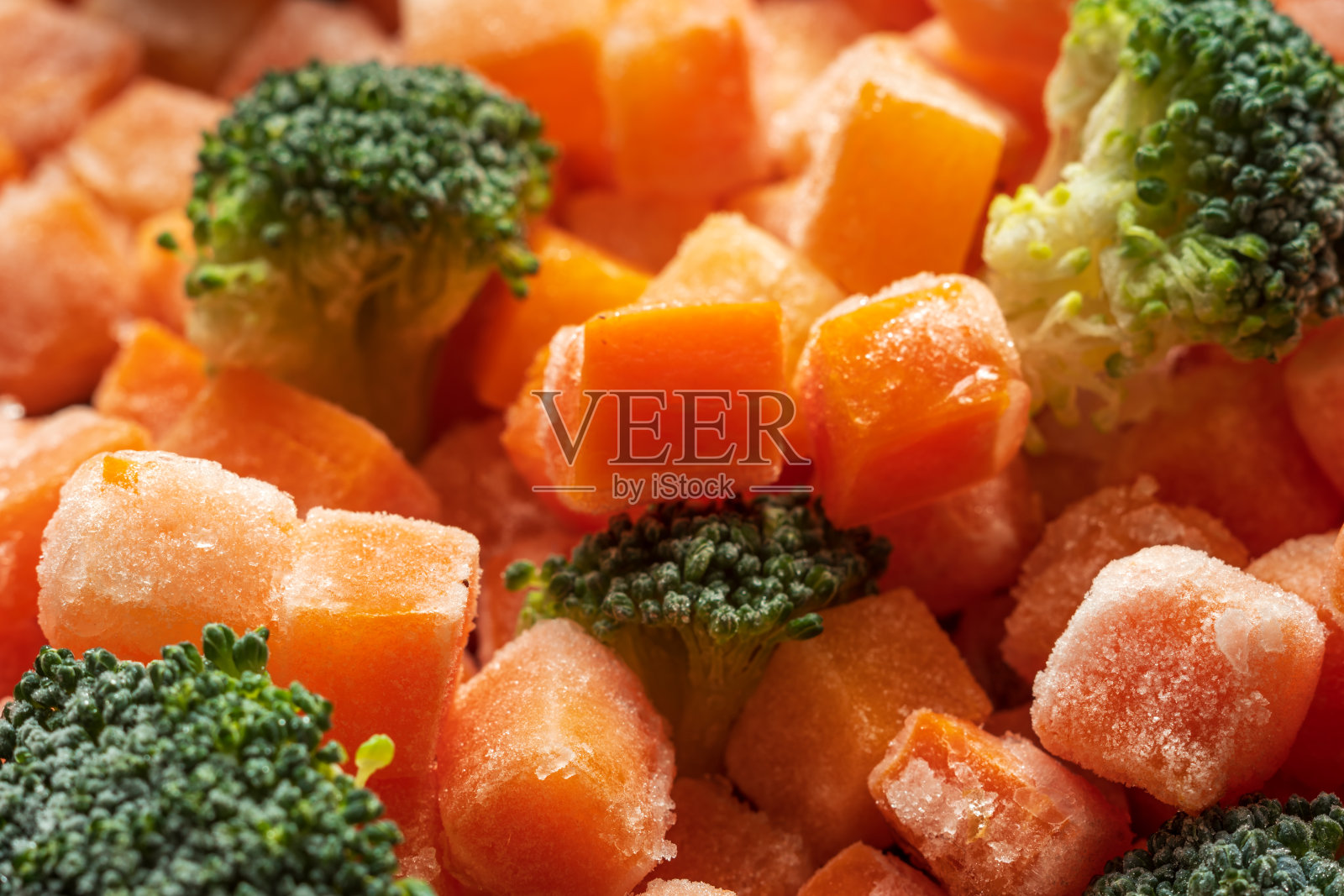 冰冻胡萝卜花椰菜片特写背景照片摄影图片