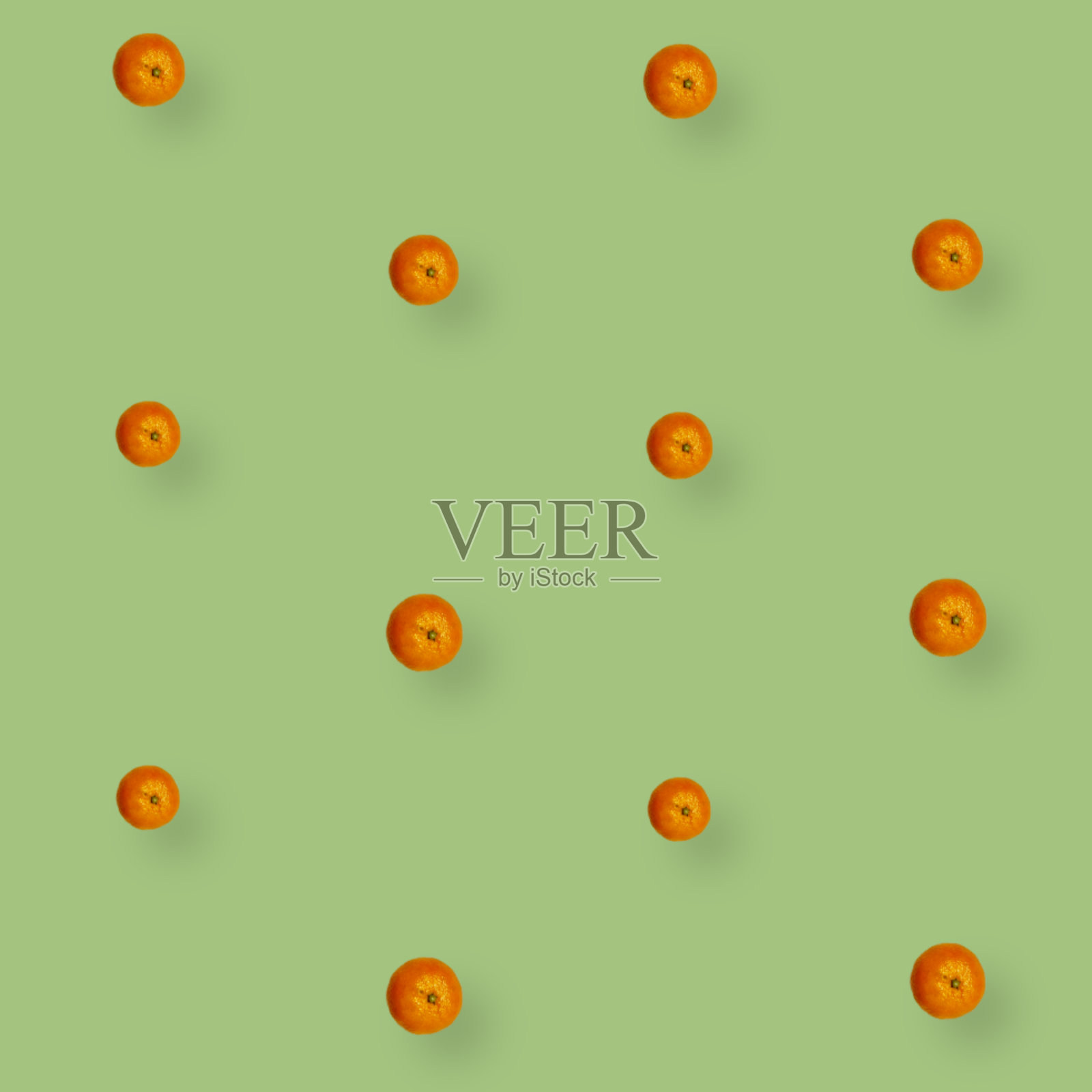 鲜艳的水果图案新鲜的橘子在绿色的背景。官话。前视图。平的。波普艺术设计照片摄影图片