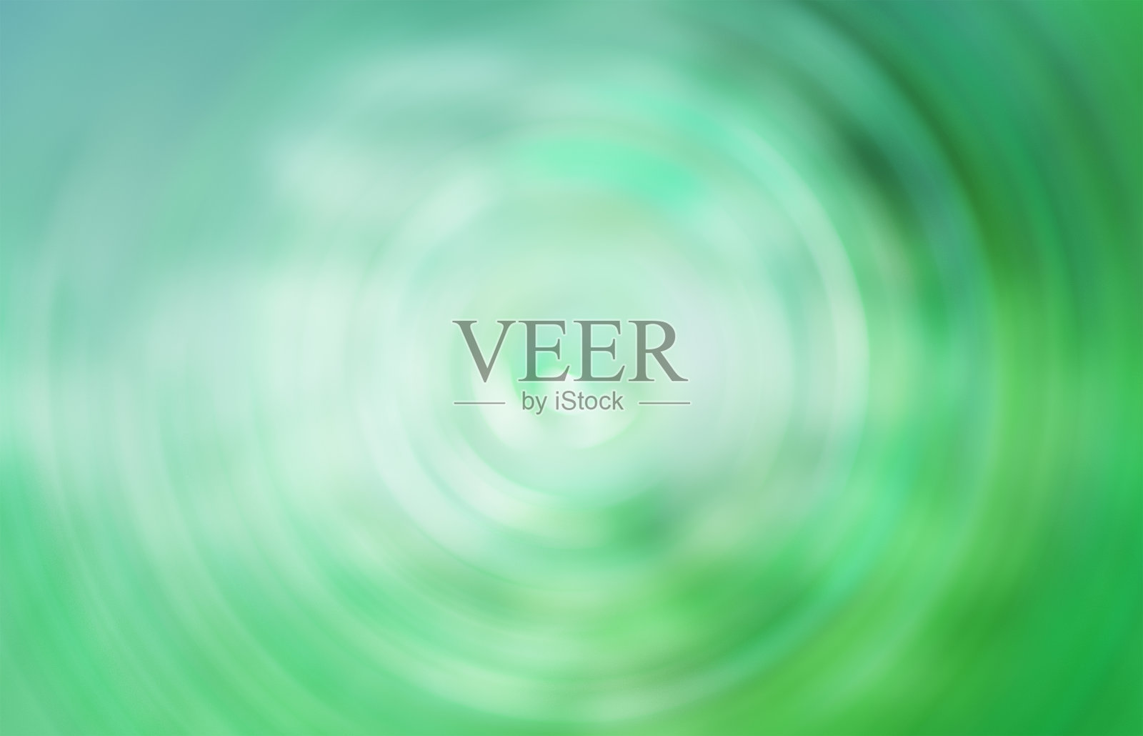 一滴水打在平静的彩色表面上照片摄影图片