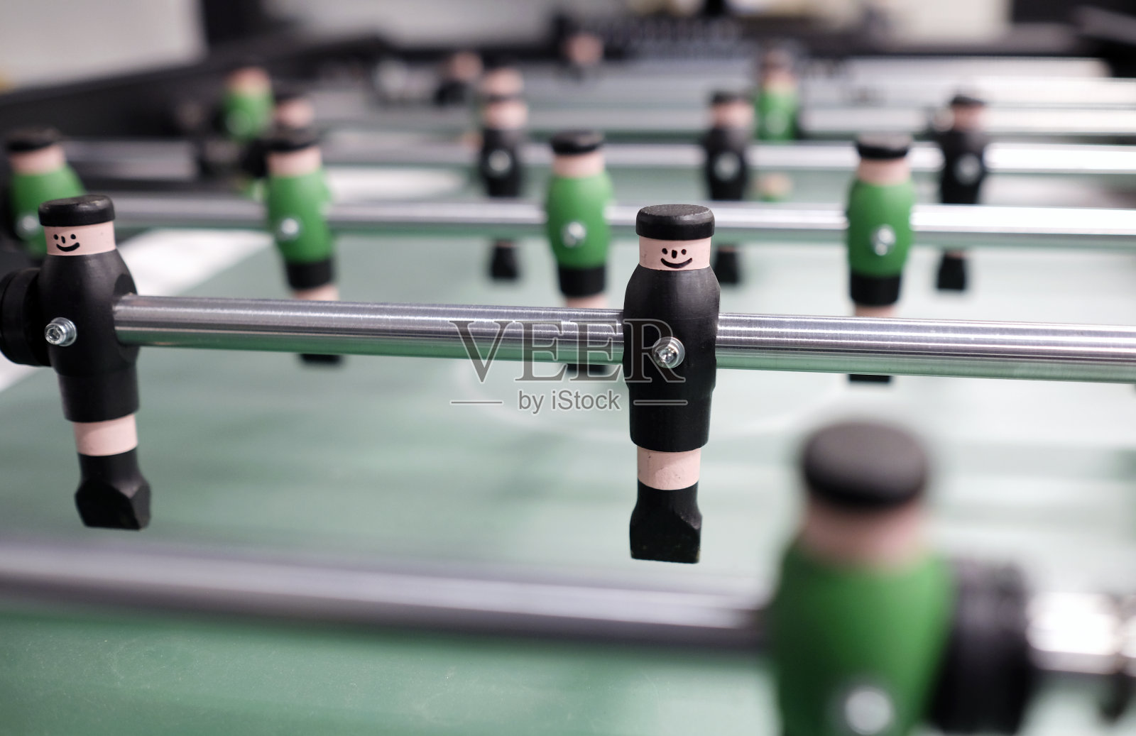 选择性地关注桌上足球运动员照片摄影图片