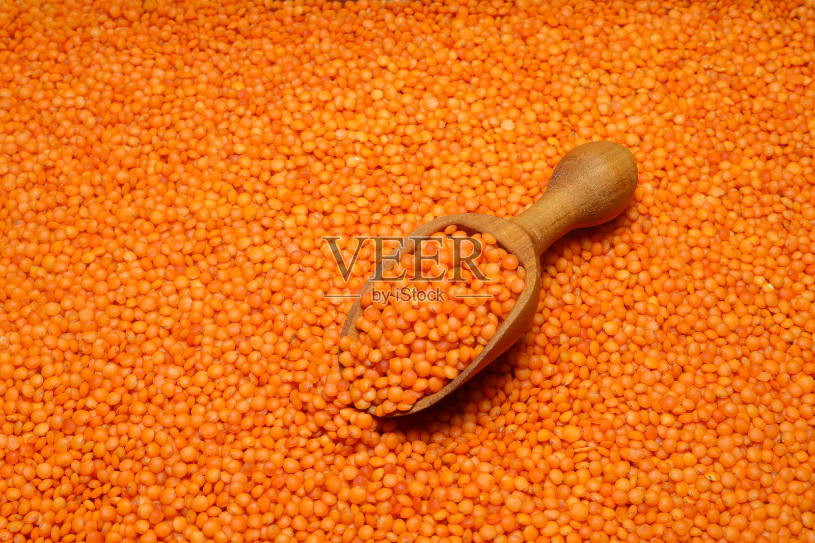 用勺子拍散的红豆照片摄影图片