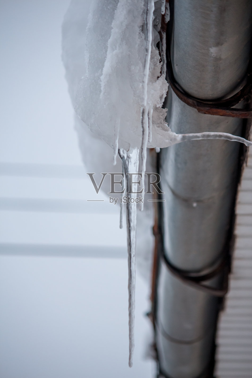 冬季冰柱的特写镜头照片摄影图片